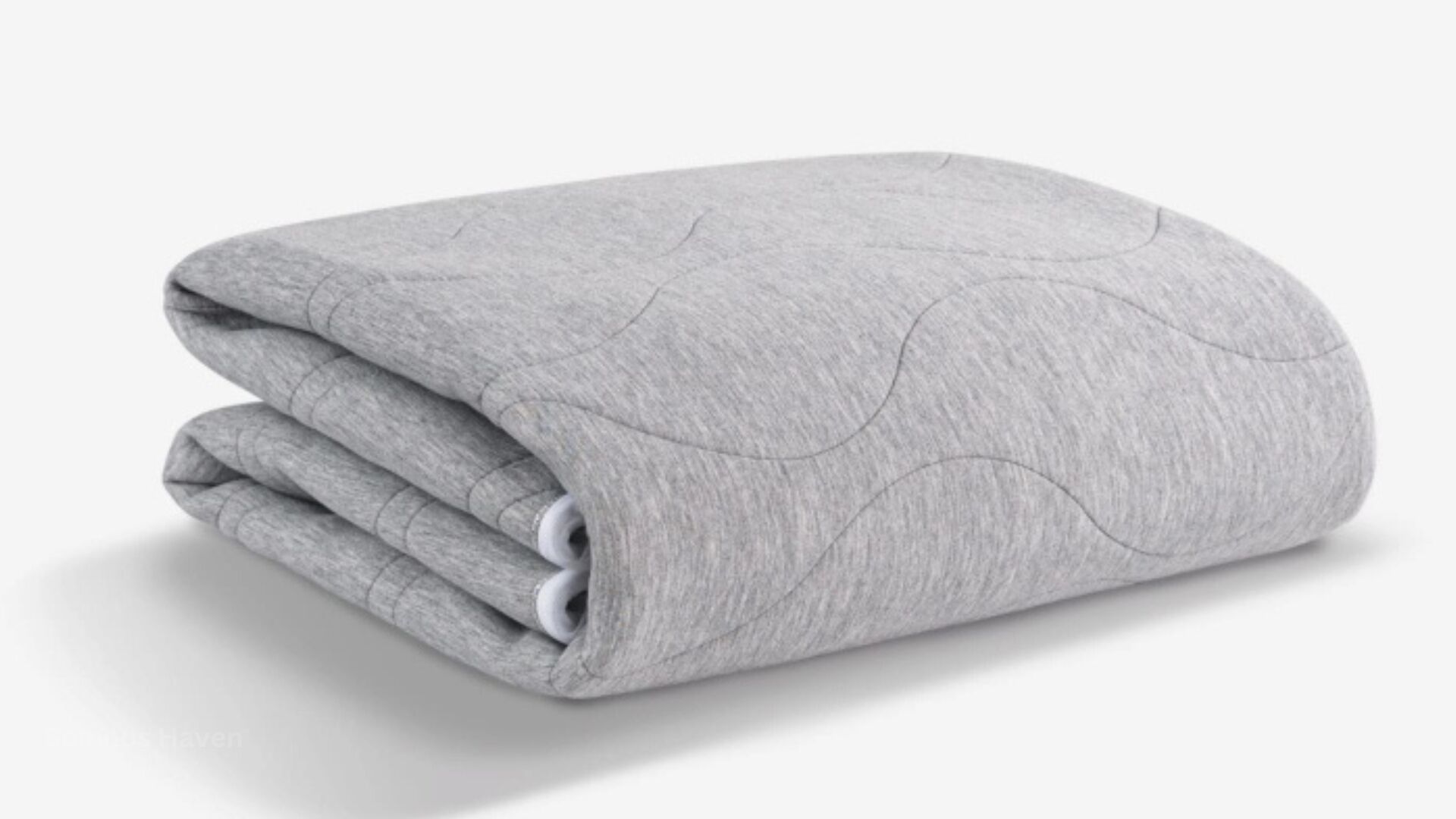Plush gray fleece blanket with quilted pattern, perfect for modern and cozy decor.