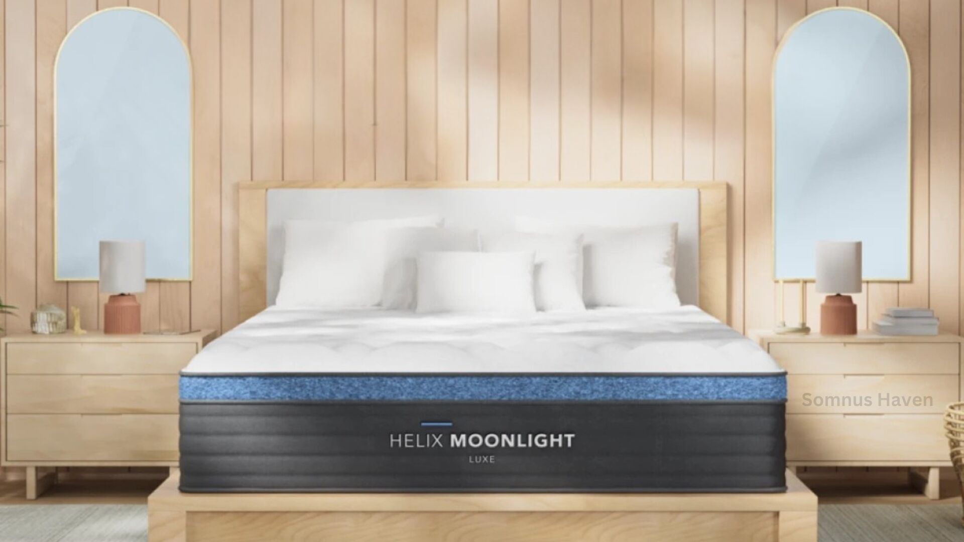 Modern bedroom with Helix Moonlight mattress, light wood accents, plush bedding, and arched mirrors.