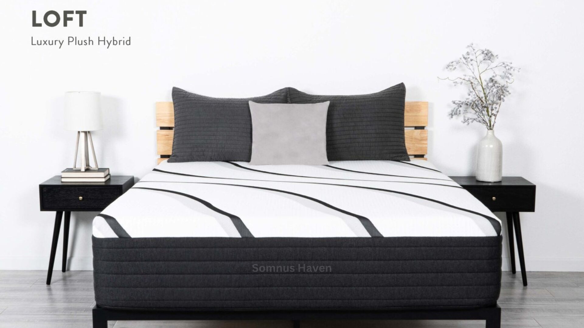 Luxurious modern bedroom with hybrid mattress, wood slat headboard, gray pillows, and elegant decor.