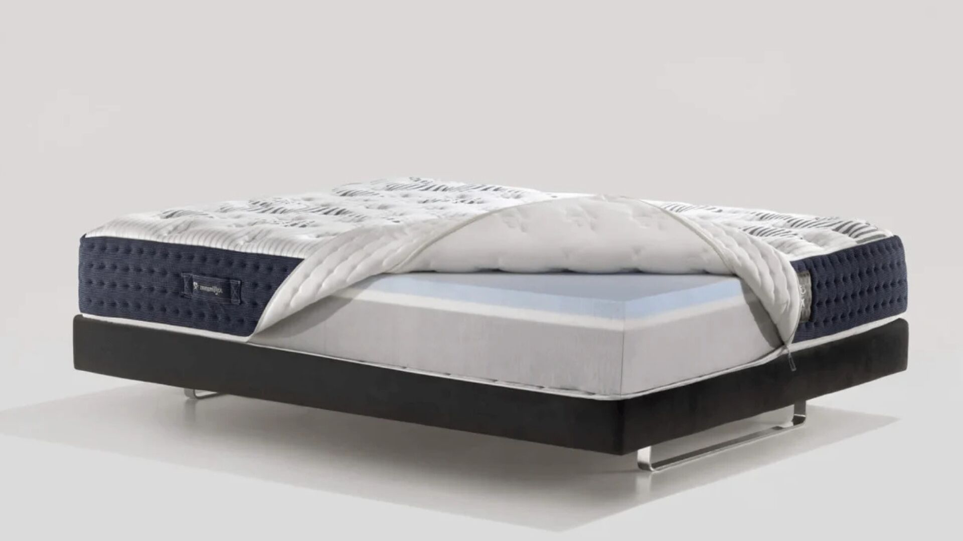 Contemporary luxury mattress with quilted top, hybrid design, and breathable technology.