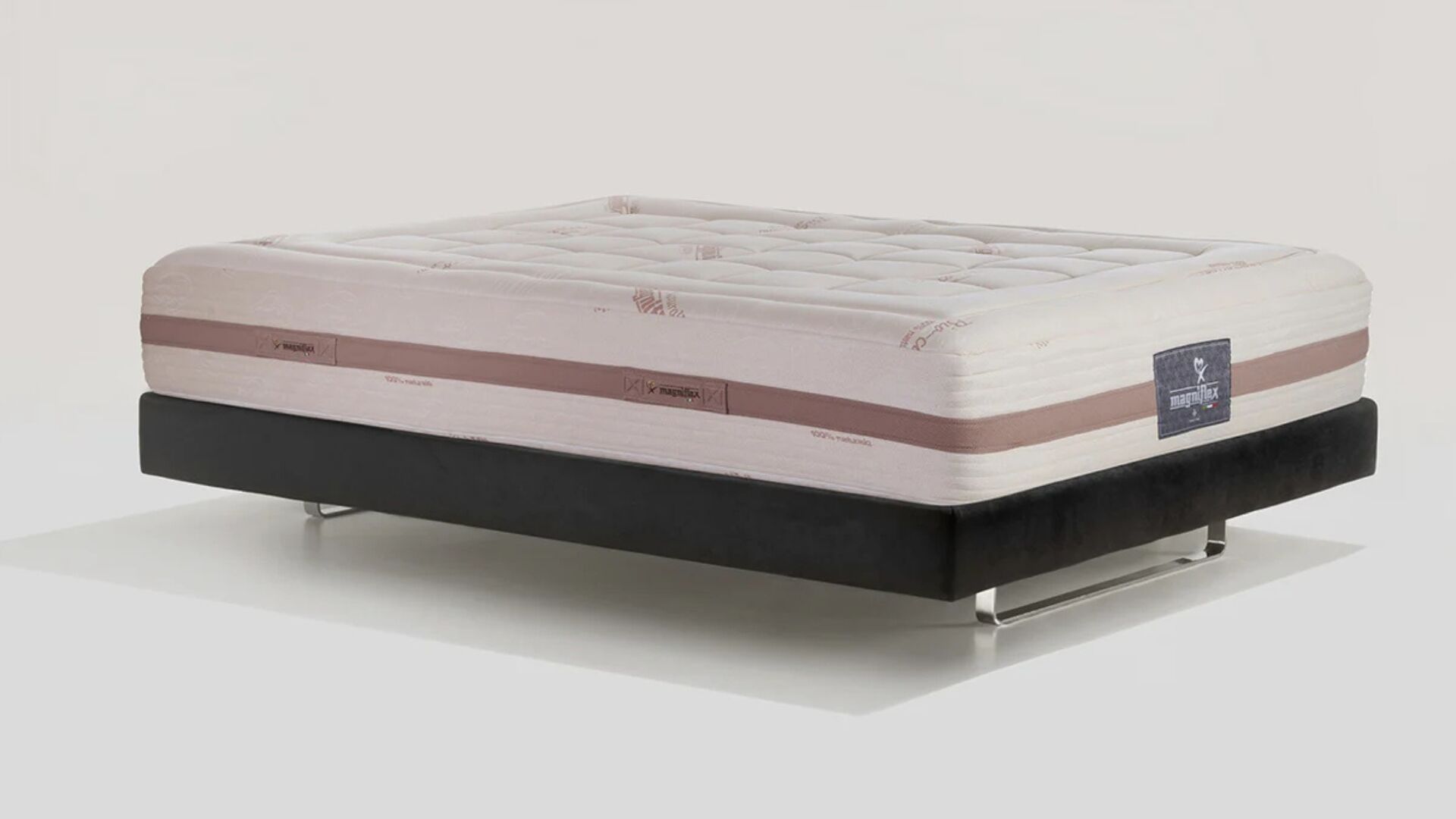 Luxury cream mattress with elegant stitched design and modern base for comfort and style.