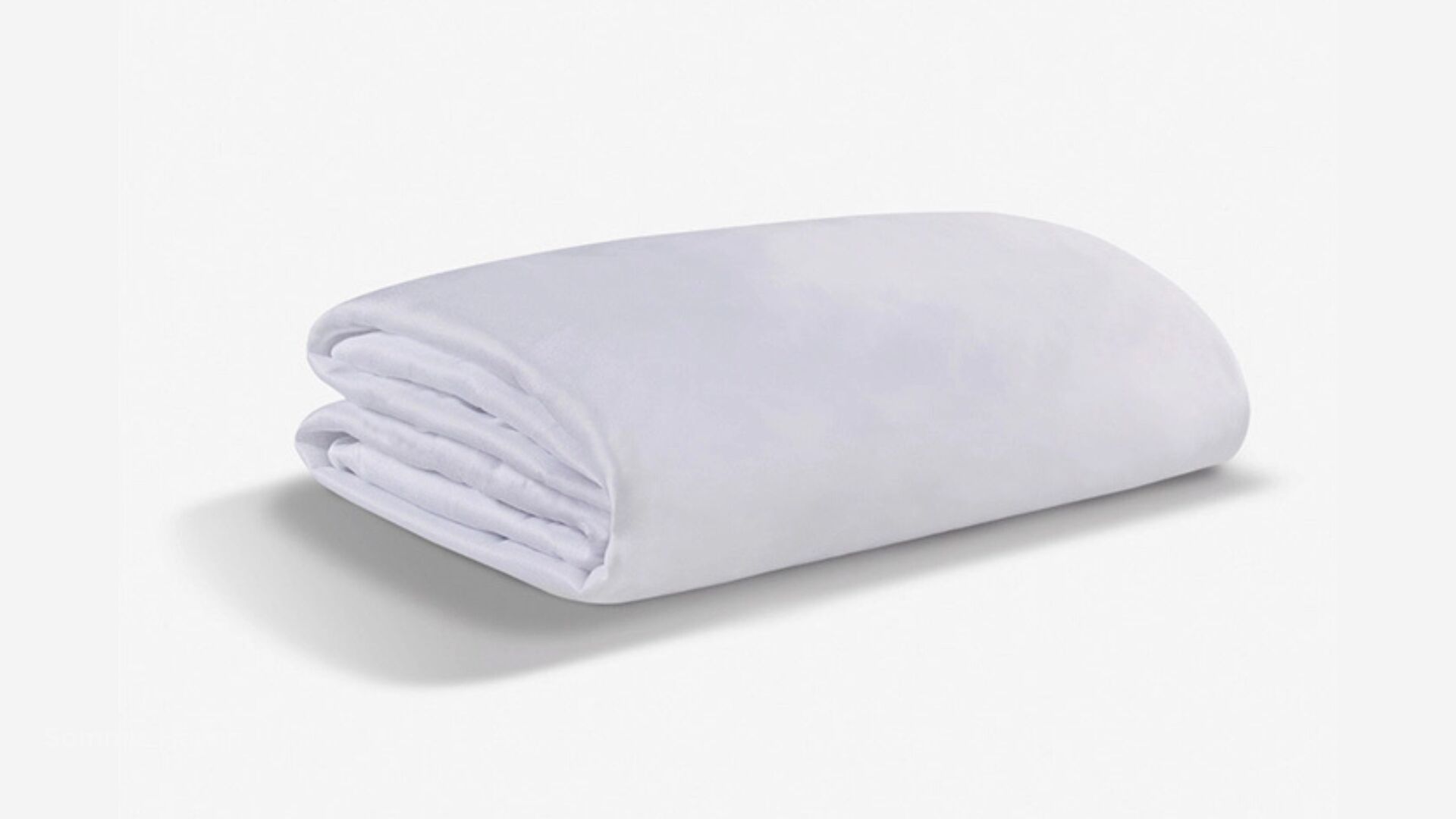 Soft white blanket with minimalist design, offering warmth and comfort for any decor.