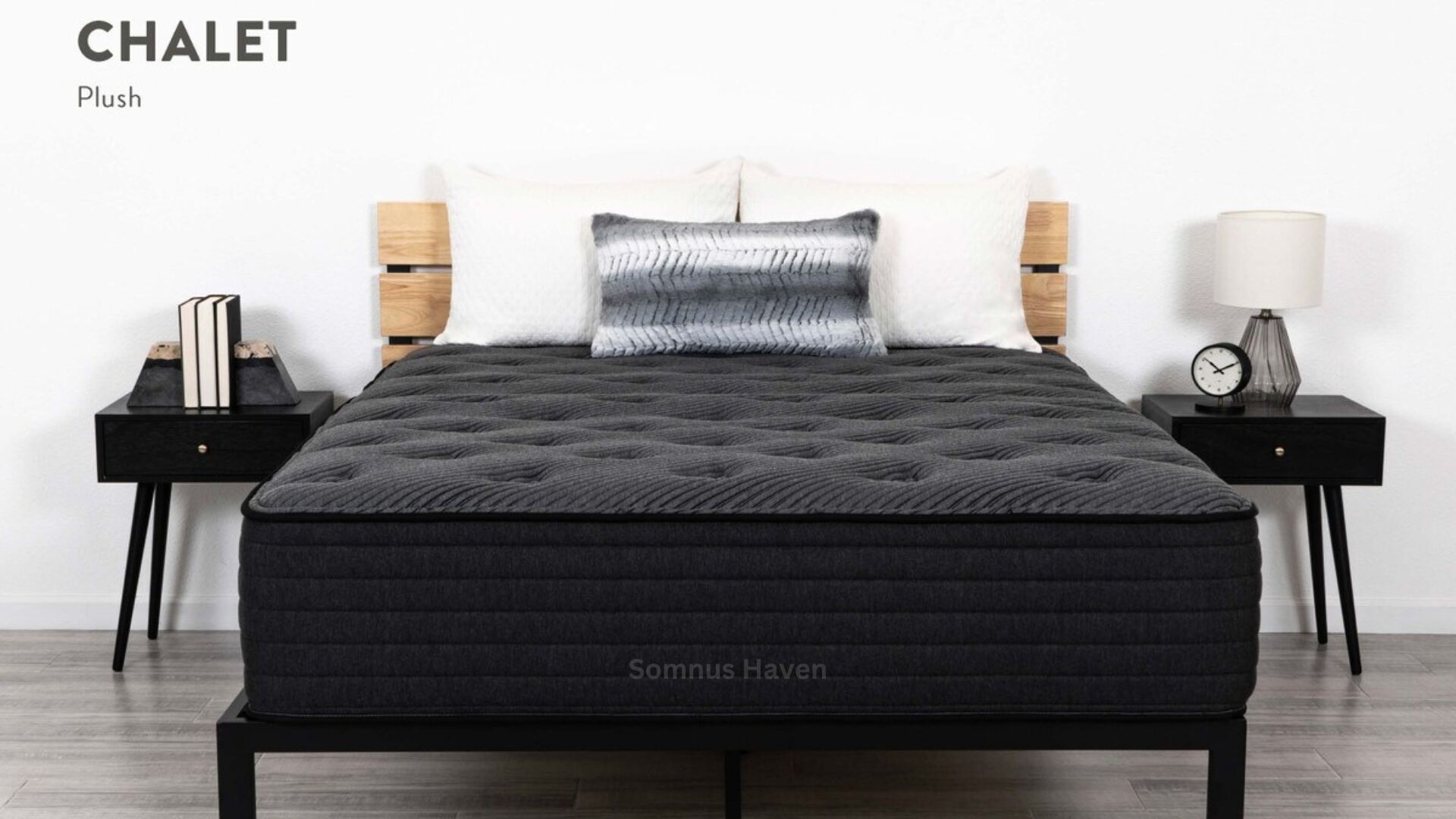 Modern bedroom with Chalet plush mattress, charcoal gray, minimalist design, serene ambiance.
